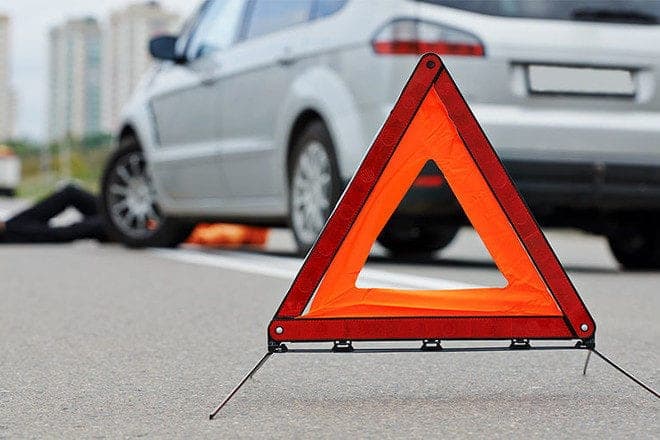 A schoolboy on a bicycle was hit by a car on the street. lobanca