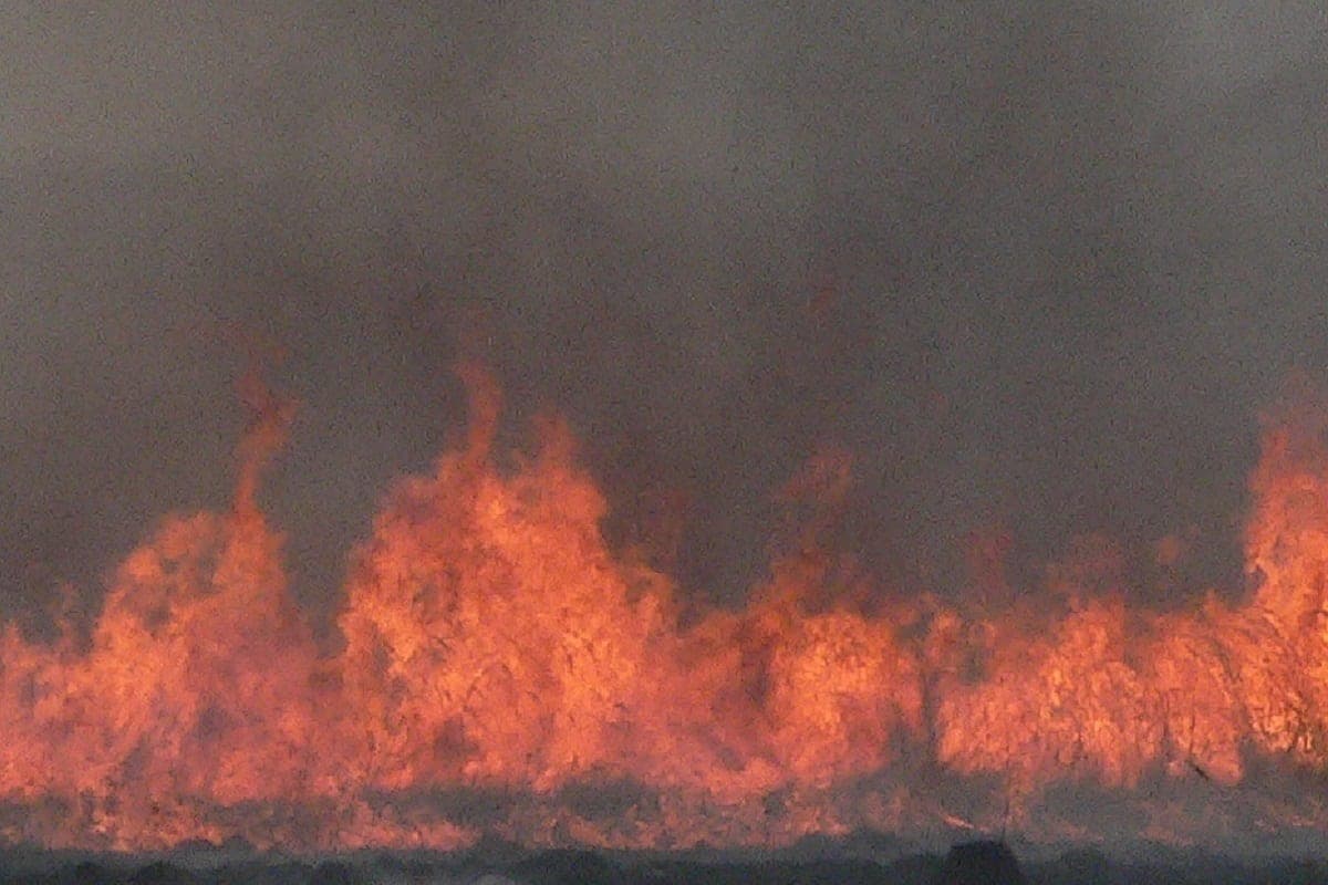 Became aware of a fire on a ship off the coast of Iraq