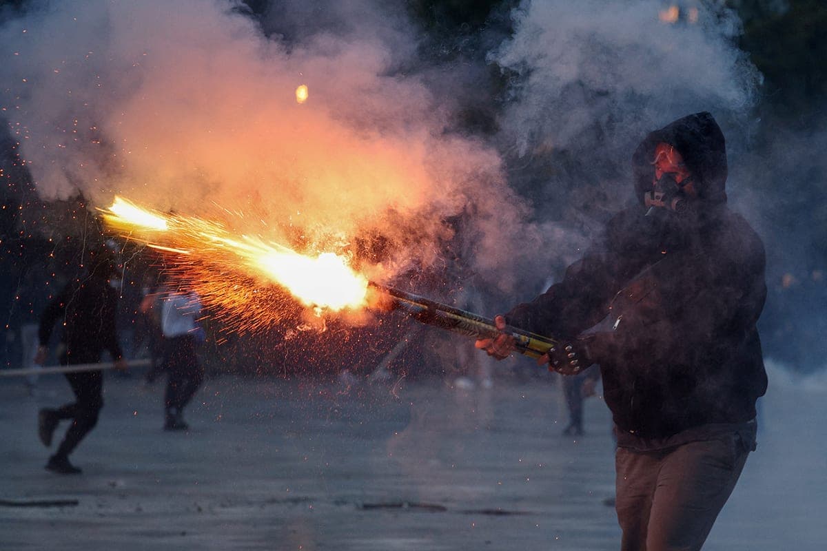 Protesters set fire to city hall in Albania