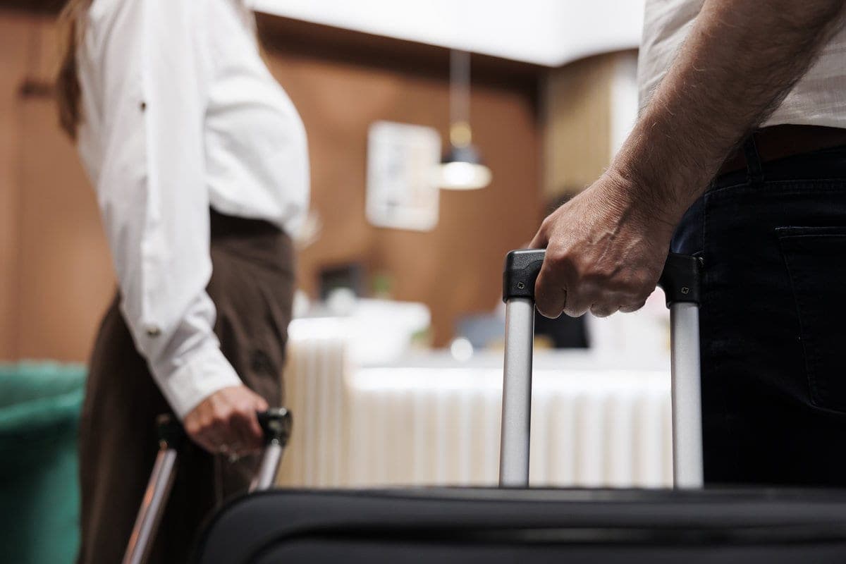 What documents are suitable for checking into a hotel other than a passport? MWH responded