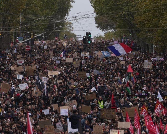Hundreds of thousands march across France in protests over schools and policing