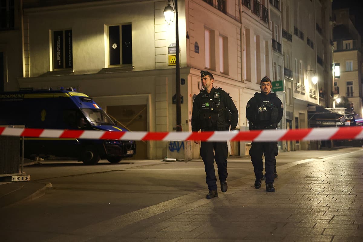 Gendarmerie officers patrol the area during the night curfew. Paris, France