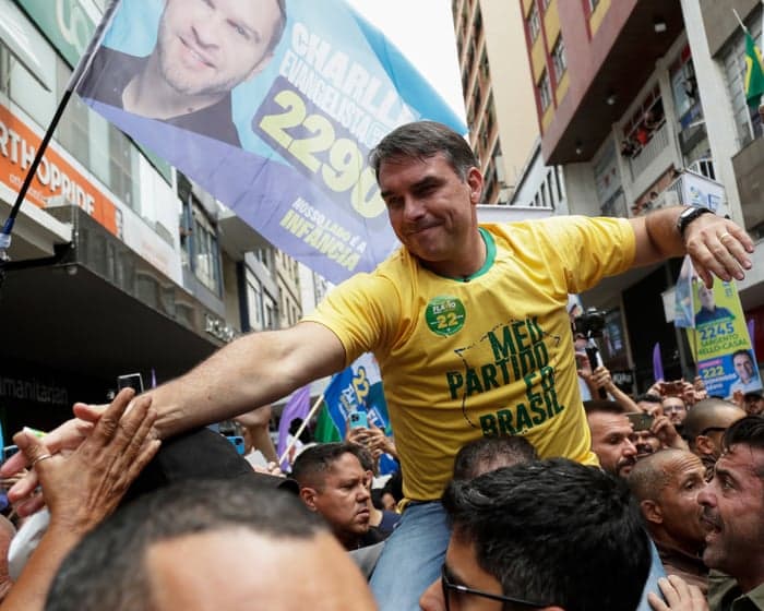 ‘A coin flip’: on Flávio Bolsonaro’s campaign trail as Brazil’s far right edges back to power