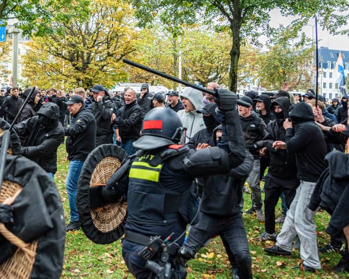 Dutch riot police break up violent far-right protest in The Hague