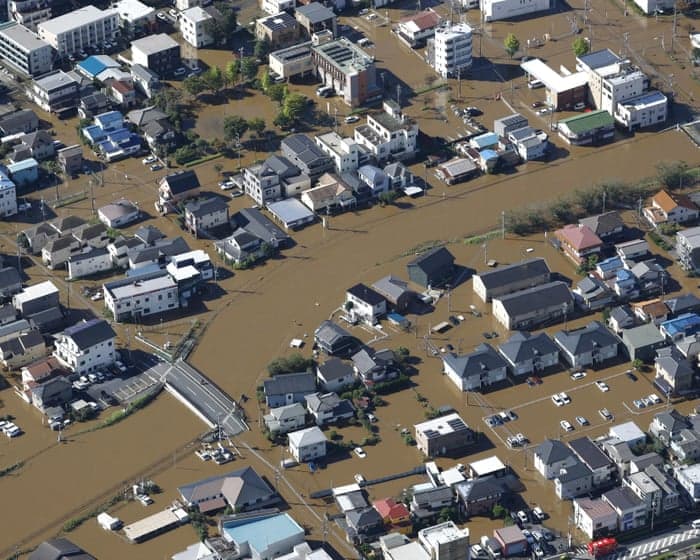 At least four people killed in Japan as typhoon Dujuan triggers heavy rain, landslides