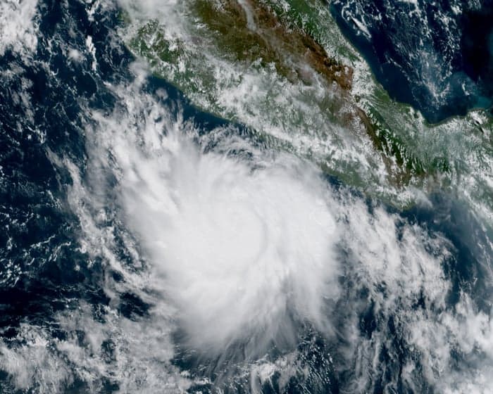 Hurricane Polo, rapidly intensifying from strong El Niño patterns, rages off coast of Mexico