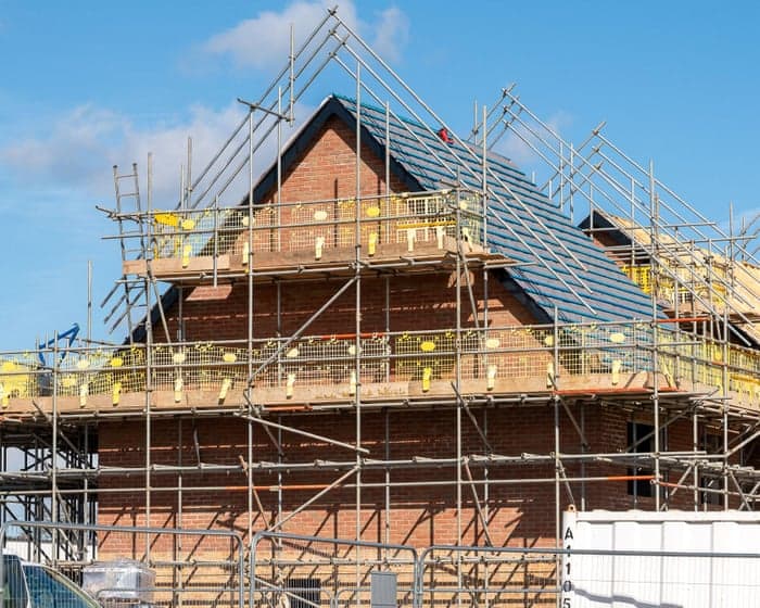 Housebuilder Vistry slashes profit forecasts as losses balloon