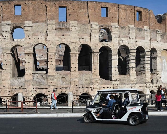 ‘I have to dodge them all the time’: Rome locals incensed by rise in golf cart tours